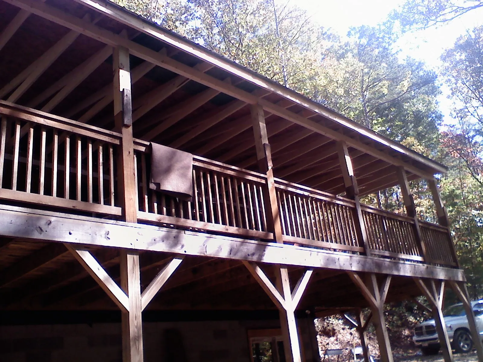 Timber framing under a new elevated porch and deck — Roof Leak Repair in East Greenwich by Roofing Brothers